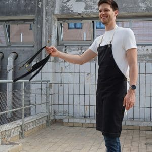 Zwart horeca halterschort met zakken